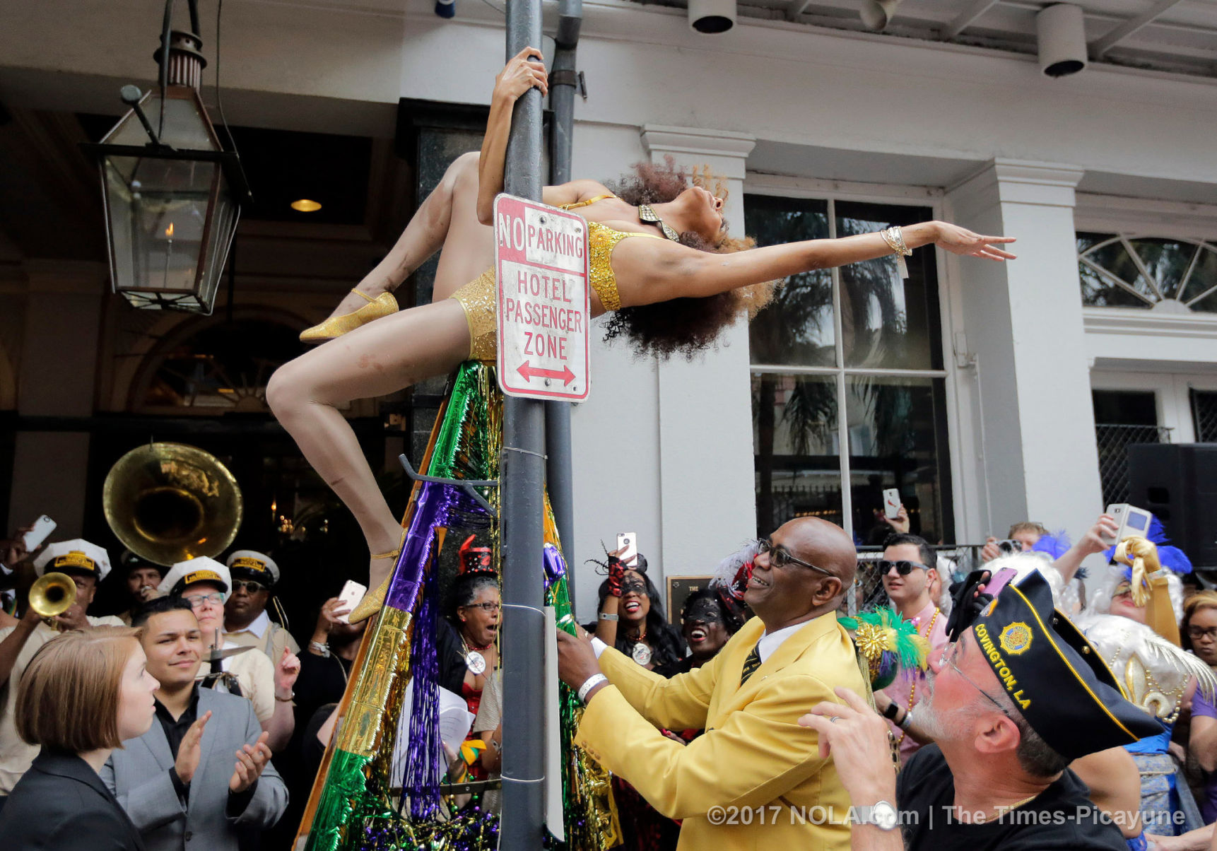 Only on Bourbon Street: Greasing of the Poles for Mardi Gras